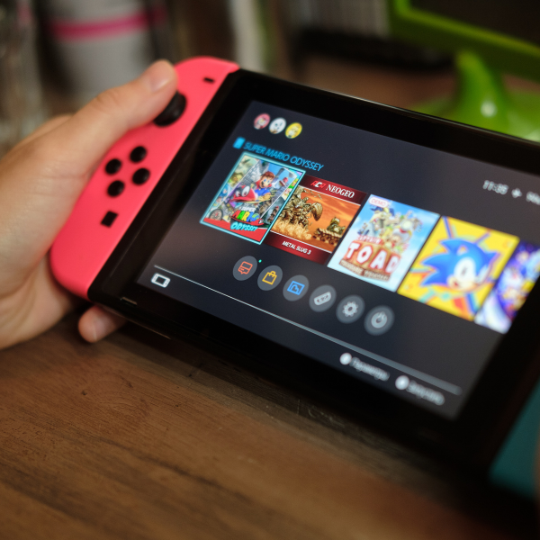 Image of child holding Nintendo Switch